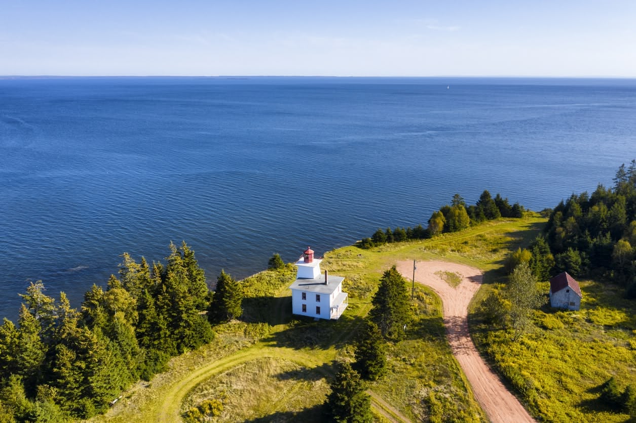 Scenic views of various Canadian cities, showcasing expansive urban landscapes and skylines from elevated vantage points.