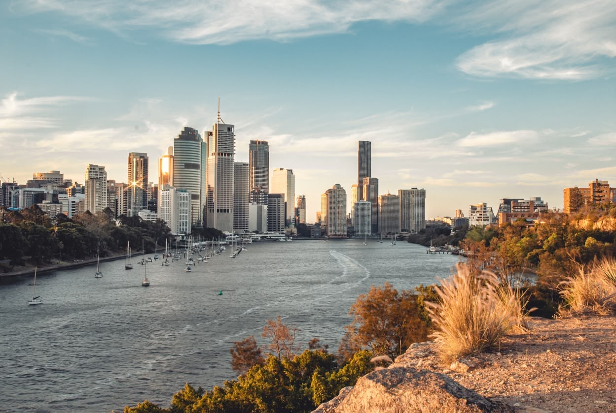 Scenic views of various Asia-Pacific cities, showcasing expansive urban landscapes and iconic skylines from elevated vantage points.