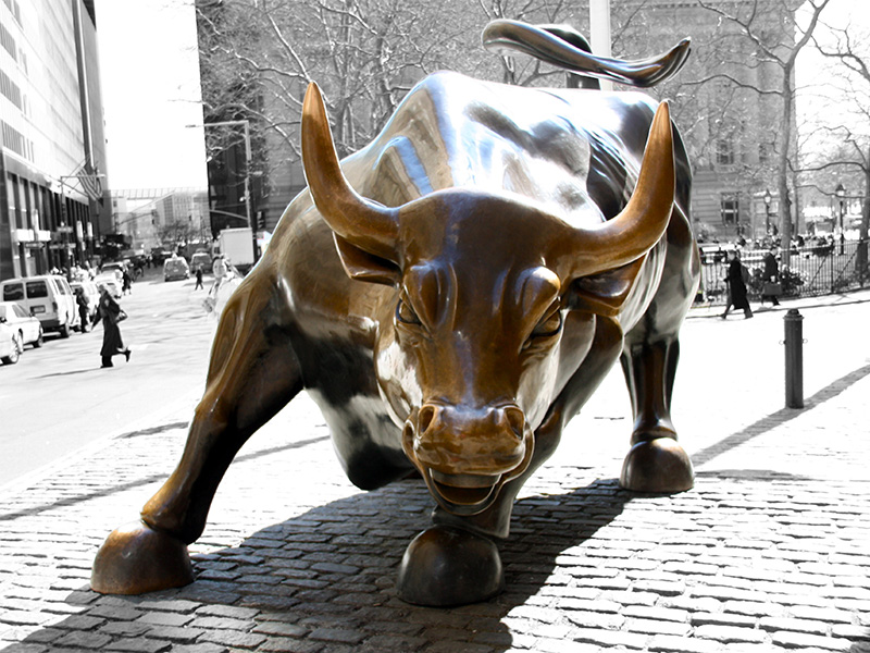 Image of a statue of a charging bull